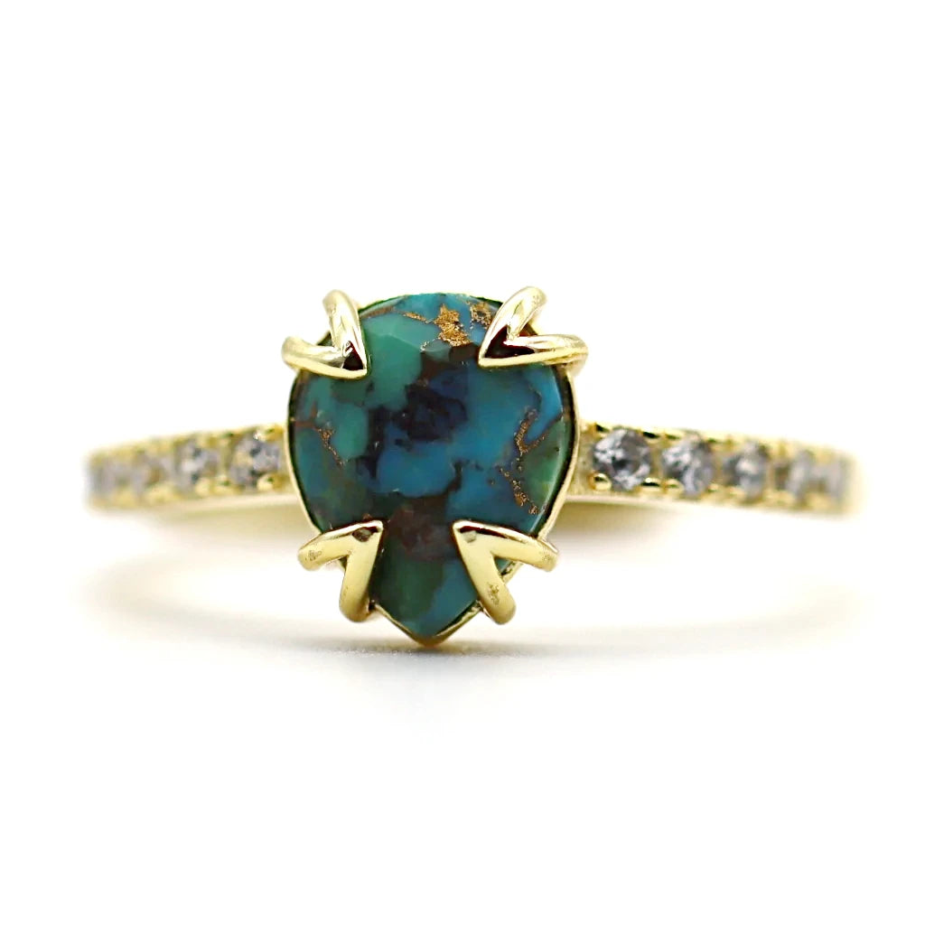 Bague turquoise Soléa avec pierre naturelle bleu turquoise et dessins dorés, montée sur argent 925 doré