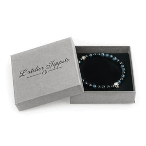 Bracelet tête de mort homme et oeil de faucon 6mm